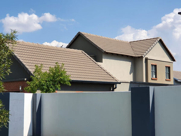 Roof with Marley Double Roman Plus Concrete Roof Tiles