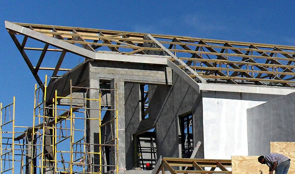 Erecting timber roof trusses at Burgundy Estate club house